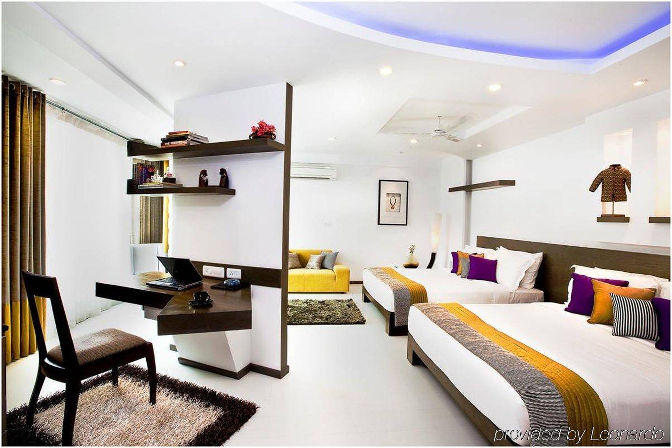 Melange Astris Aparthotel Bangalore Quarto foto